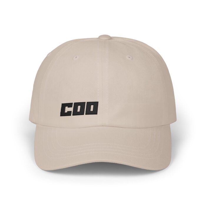 COO Cap in stone, front view of the COO embroidery